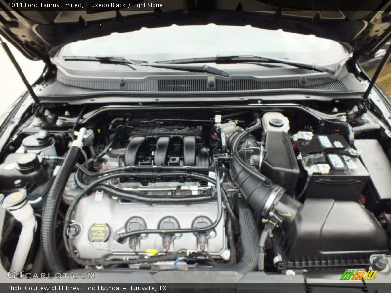 Tuxedo Black / Light Stone 2011 Ford Taurus Limited