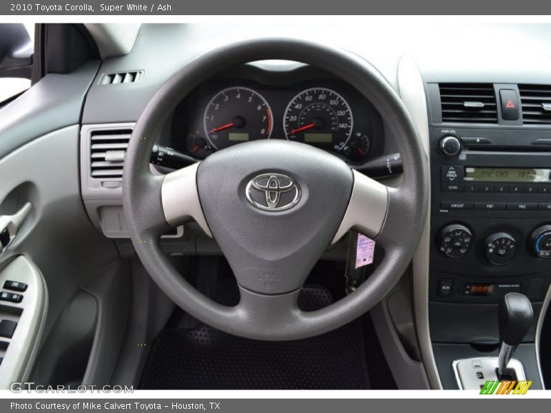Super White / Ash 2010 Toyota Corolla