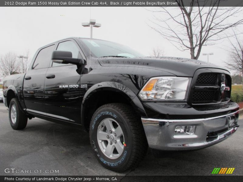 Front 3/4 View of 2012 Ram 1500 Mossy Oak Edition Crew Cab 4x4