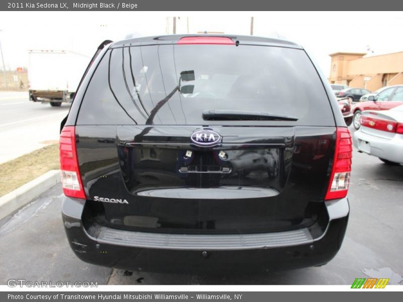 Midnight Black / Beige 2011 Kia Sedona LX