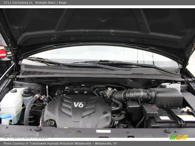 Midnight Black / Beige 2011 Kia Sedona LX