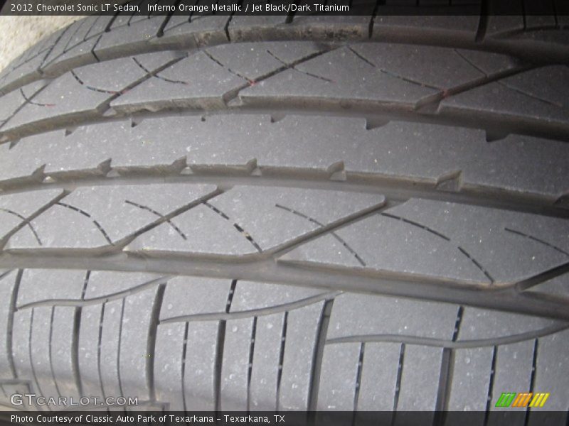 Inferno Orange Metallic / Jet Black/Dark Titanium 2012 Chevrolet Sonic LT Sedan