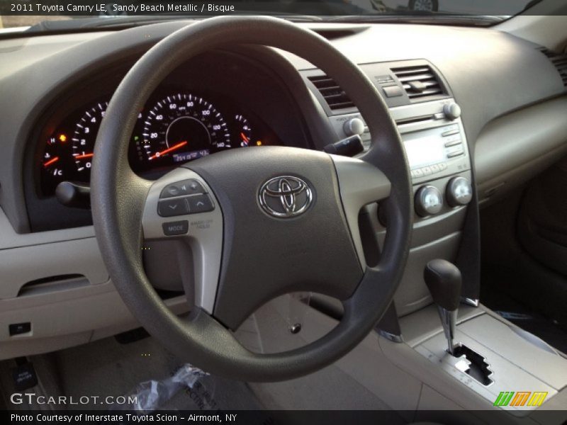 Sandy Beach Metallic / Bisque 2011 Toyota Camry LE