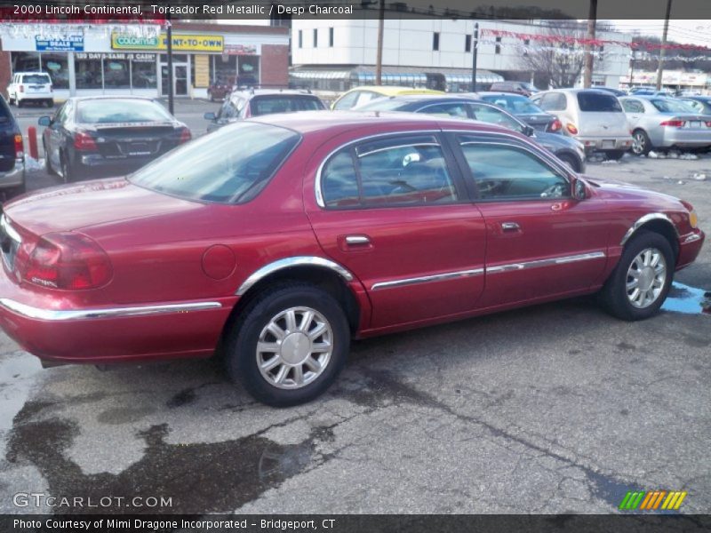 Toreador Red Metallic / Deep Charcoal 2000 Lincoln Continental