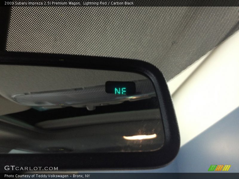 Lightning Red / Carbon Black 2009 Subaru Impreza 2.5i Premium Wagon