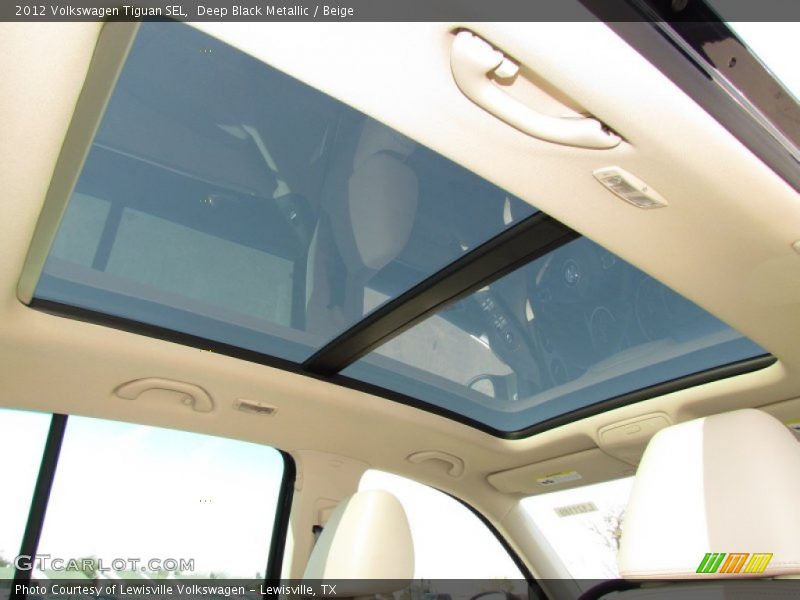 Deep Black Metallic / Beige 2012 Volkswagen Tiguan SEL