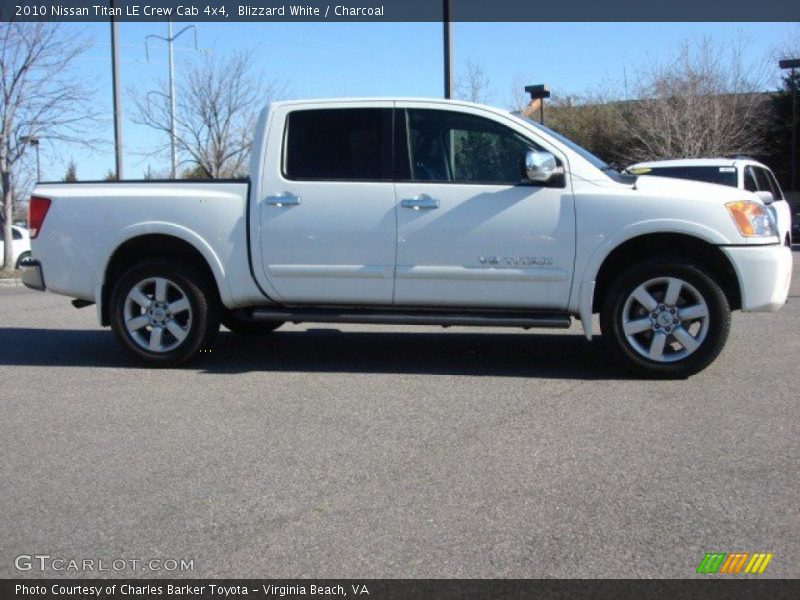 Blizzard White / Charcoal 2010 Nissan Titan LE Crew Cab 4x4