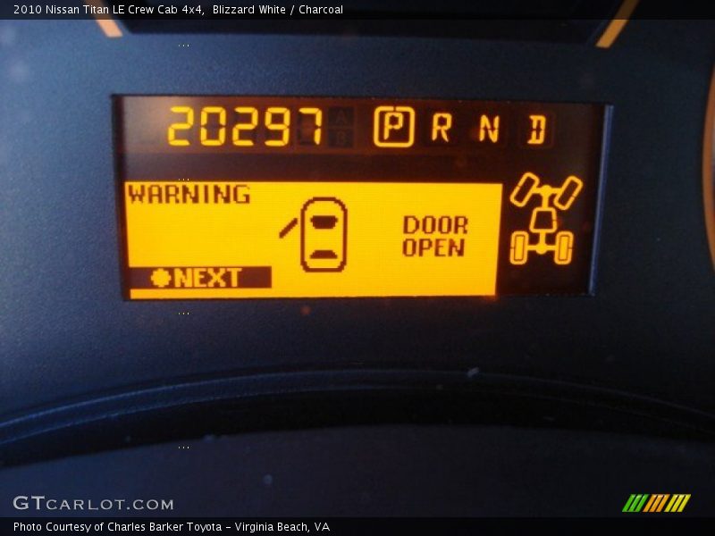 Blizzard White / Charcoal 2010 Nissan Titan LE Crew Cab 4x4