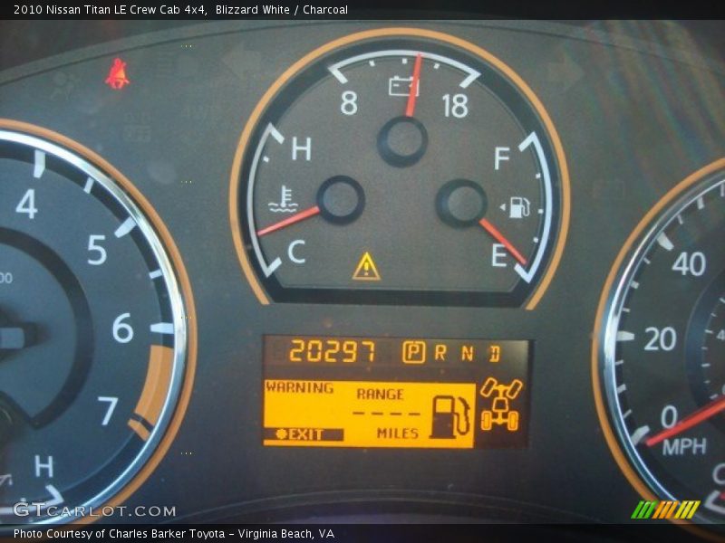 Blizzard White / Charcoal 2010 Nissan Titan LE Crew Cab 4x4