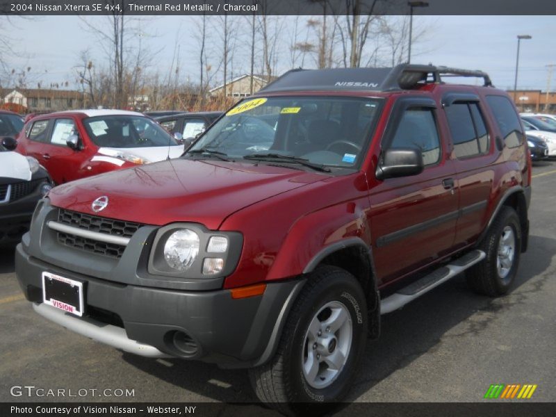 Thermal Red Metallic / Charcoal 2004 Nissan Xterra SE 4x4