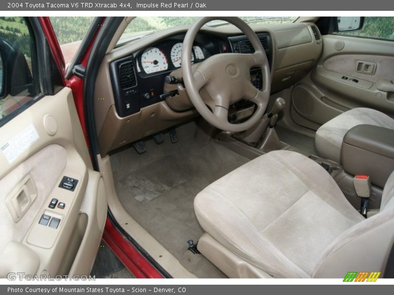Impulse Red Pearl / Oak 2004 Toyota Tacoma V6 TRD Xtracab 4x4