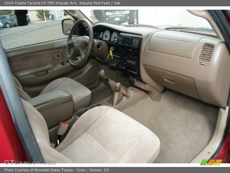 Impulse Red Pearl / Oak 2004 Toyota Tacoma V6 TRD Xtracab 4x4