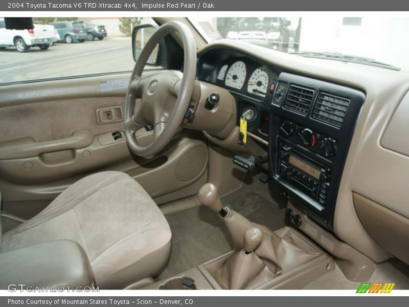 Impulse Red Pearl / Oak 2004 Toyota Tacoma V6 TRD Xtracab 4x4