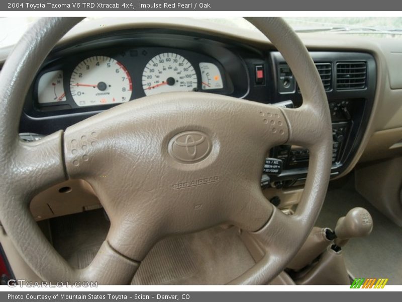 Impulse Red Pearl / Oak 2004 Toyota Tacoma V6 TRD Xtracab 4x4