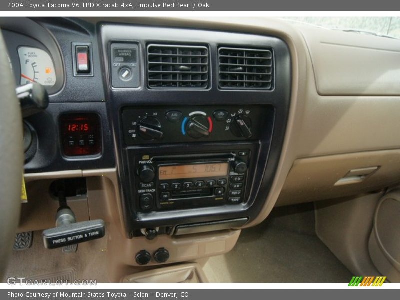 Impulse Red Pearl / Oak 2004 Toyota Tacoma V6 TRD Xtracab 4x4