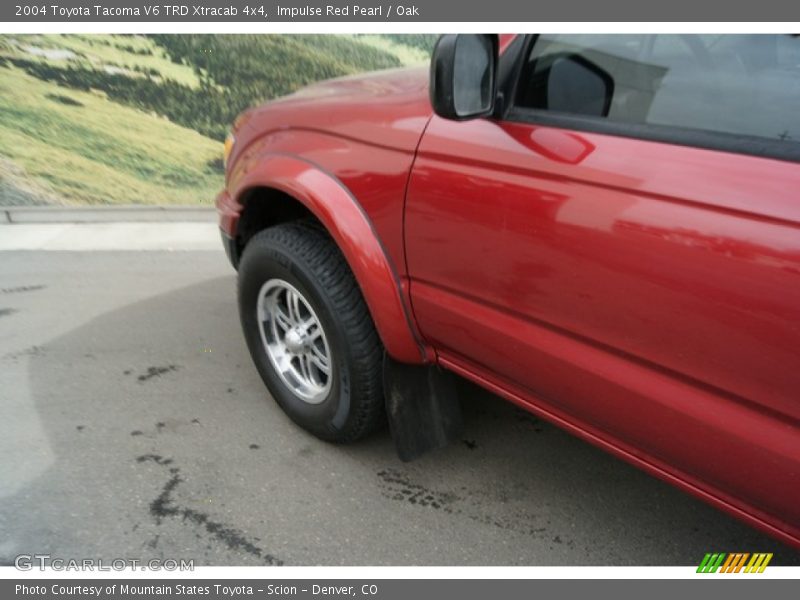 Impulse Red Pearl / Oak 2004 Toyota Tacoma V6 TRD Xtracab 4x4