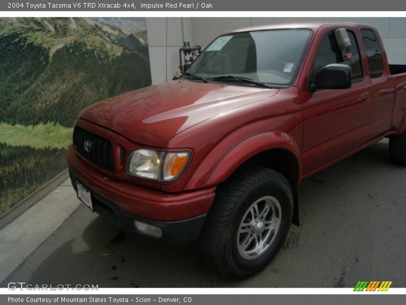 Impulse Red Pearl / Oak 2004 Toyota Tacoma V6 TRD Xtracab 4x4