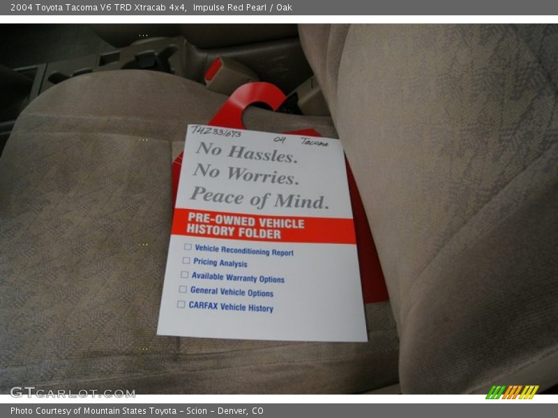 Impulse Red Pearl / Oak 2004 Toyota Tacoma V6 TRD Xtracab 4x4