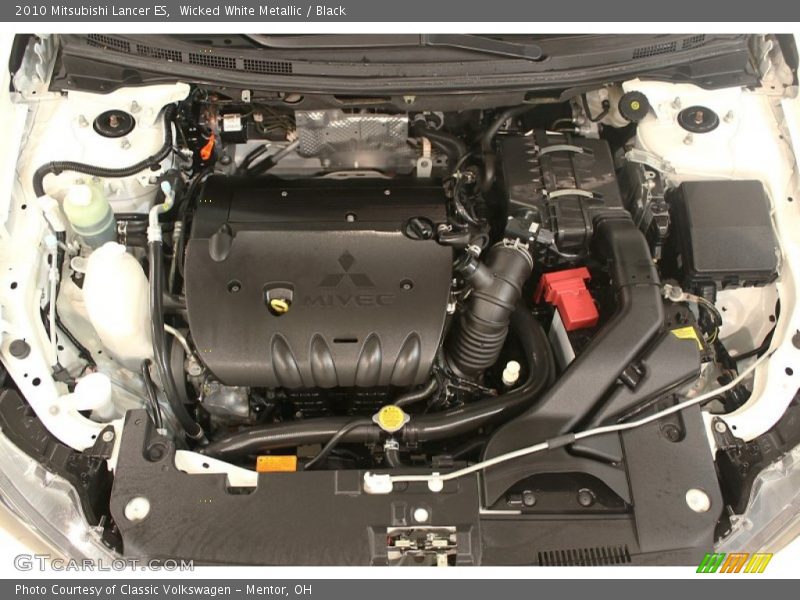 Wicked White Metallic / Black 2010 Mitsubishi Lancer ES