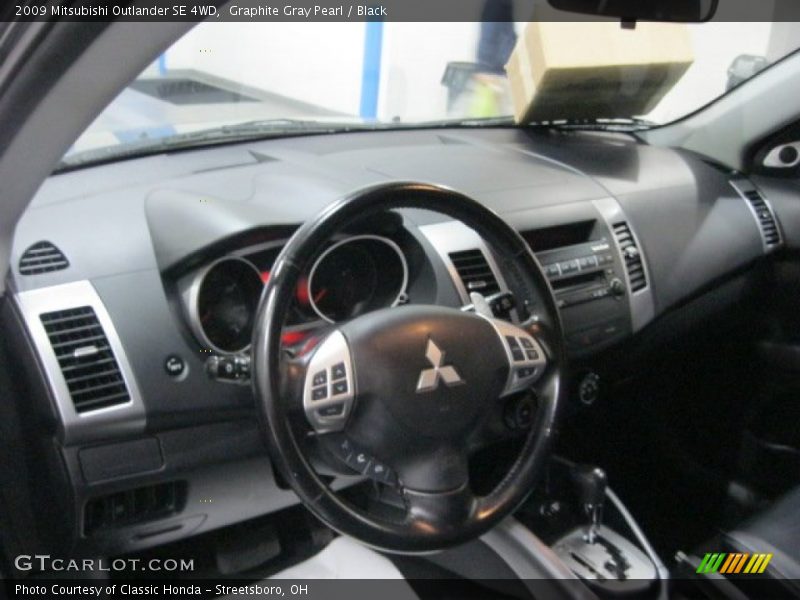 Graphite Gray Pearl / Black 2009 Mitsubishi Outlander SE 4WD