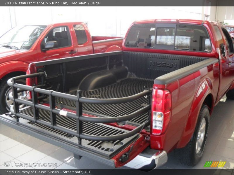 Red Alert / Beige 2010 Nissan Frontier SE V6 King Cab