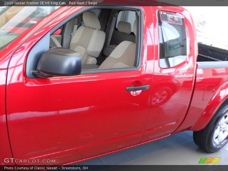 Red Alert / Beige 2010 Nissan Frontier SE V6 King Cab