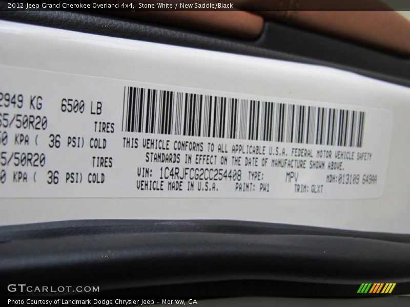 Stone White / New Saddle/Black 2012 Jeep Grand Cherokee Overland 4x4