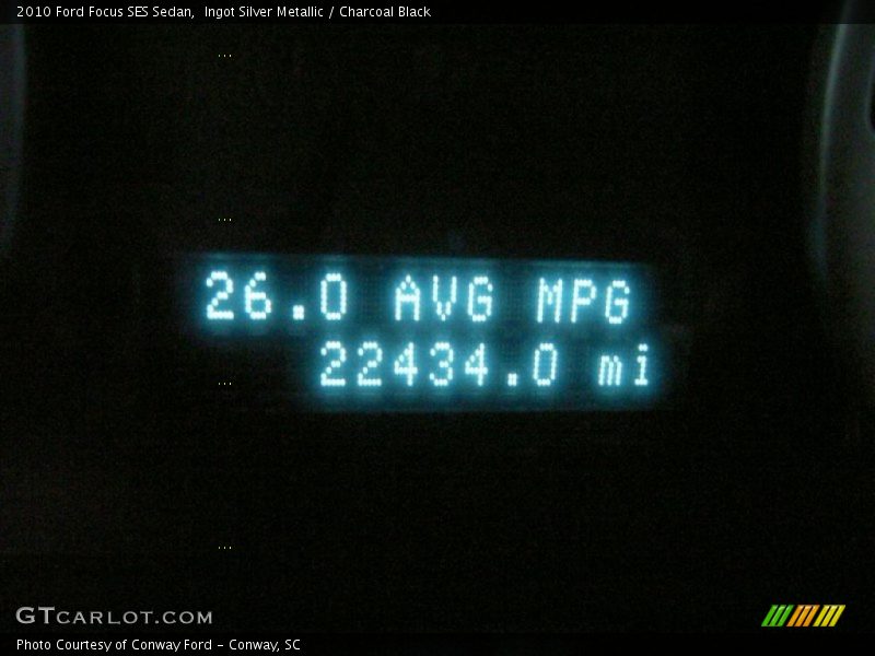 Ingot Silver Metallic / Charcoal Black 2010 Ford Focus SES Sedan