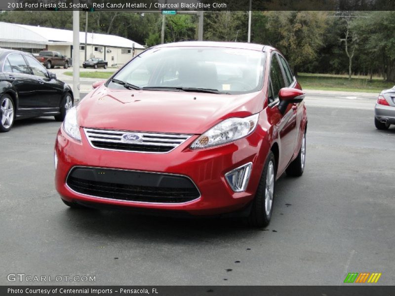 Red Candy Metallic / Charcoal Black/Blue Cloth 2011 Ford Fiesta SEL Sedan