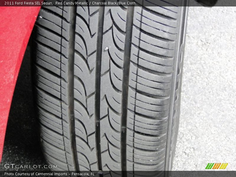 Red Candy Metallic / Charcoal Black/Blue Cloth 2011 Ford Fiesta SEL Sedan