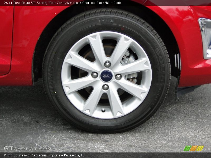 Red Candy Metallic / Charcoal Black/Blue Cloth 2011 Ford Fiesta SEL Sedan