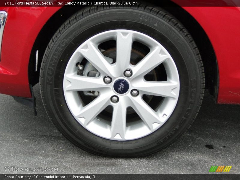 Red Candy Metallic / Charcoal Black/Blue Cloth 2011 Ford Fiesta SEL Sedan