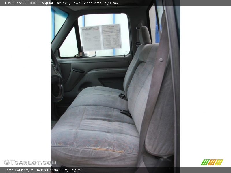 Jewel Green Metallic / Gray 1994 Ford F250 XLT Regular Cab 4x4