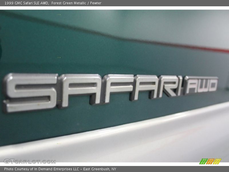  1999 Safari SLE AWD Logo