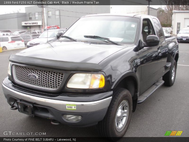 Black / Medium Prairie Tan 1999 Ford F150 XLT Extended Cab 4x4