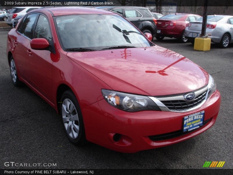 Lightning Red / Carbon Black 2009 Subaru Impreza 2.5i Sedan