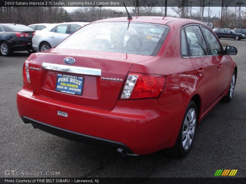 Lightning Red / Carbon Black 2009 Subaru Impreza 2.5i Sedan