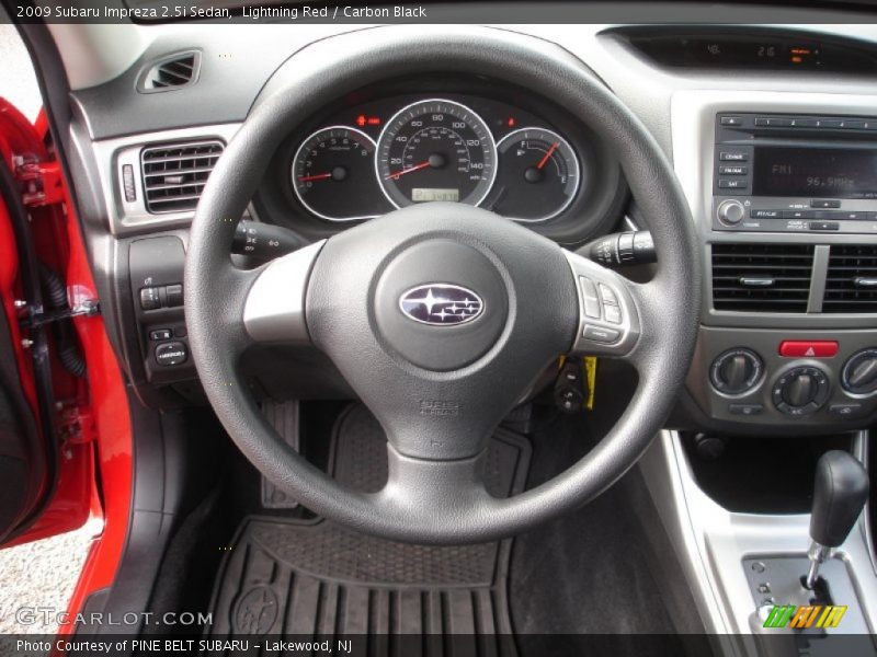 Lightning Red / Carbon Black 2009 Subaru Impreza 2.5i Sedan