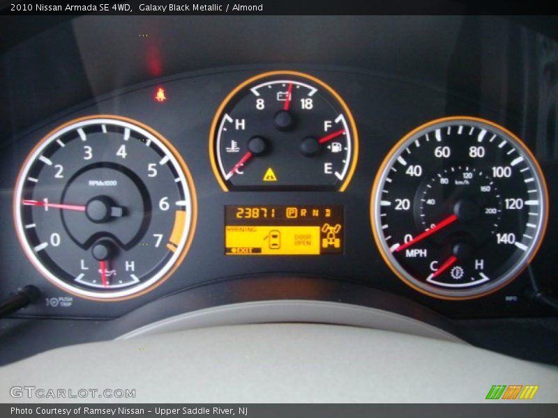 Galaxy Black Metallic / Almond 2010 Nissan Armada SE 4WD