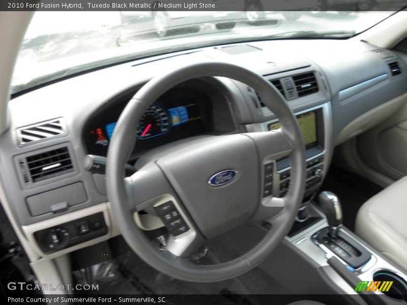Tuxedo Black Metallic / Medium Light Stone 2010 Ford Fusion Hybrid