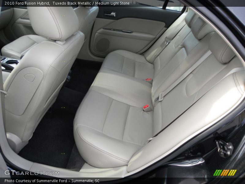 Tuxedo Black Metallic / Medium Light Stone 2010 Ford Fusion Hybrid