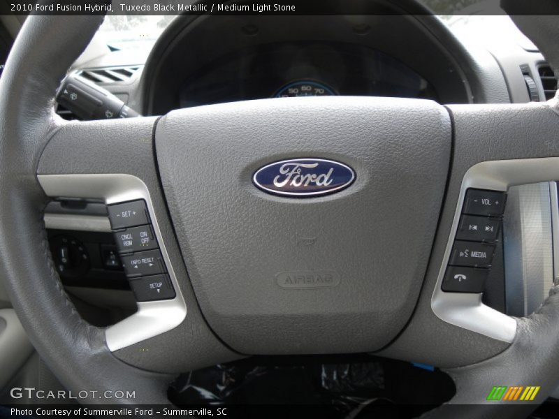Tuxedo Black Metallic / Medium Light Stone 2010 Ford Fusion Hybrid