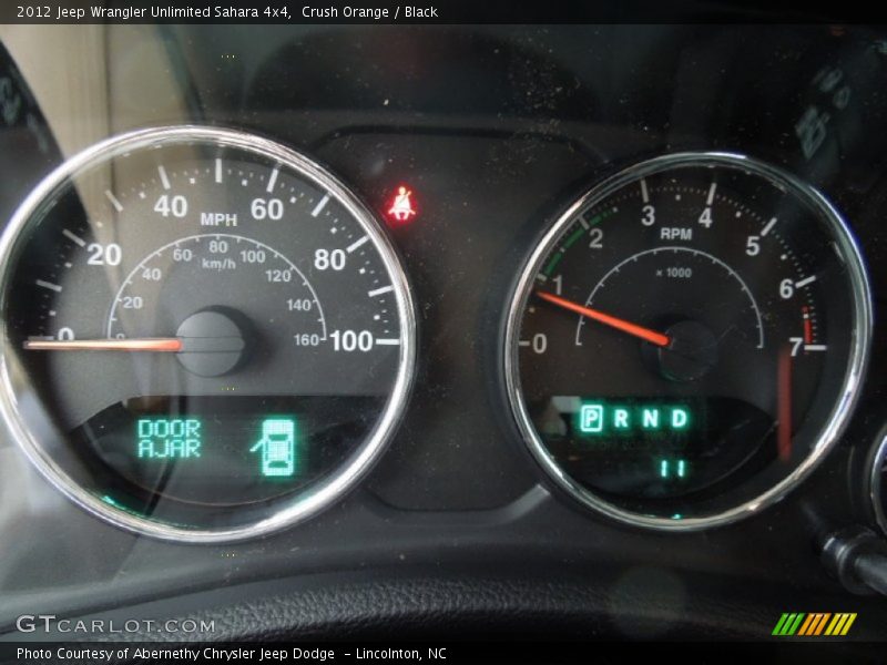 Crush Orange / Black 2012 Jeep Wrangler Unlimited Sahara 4x4