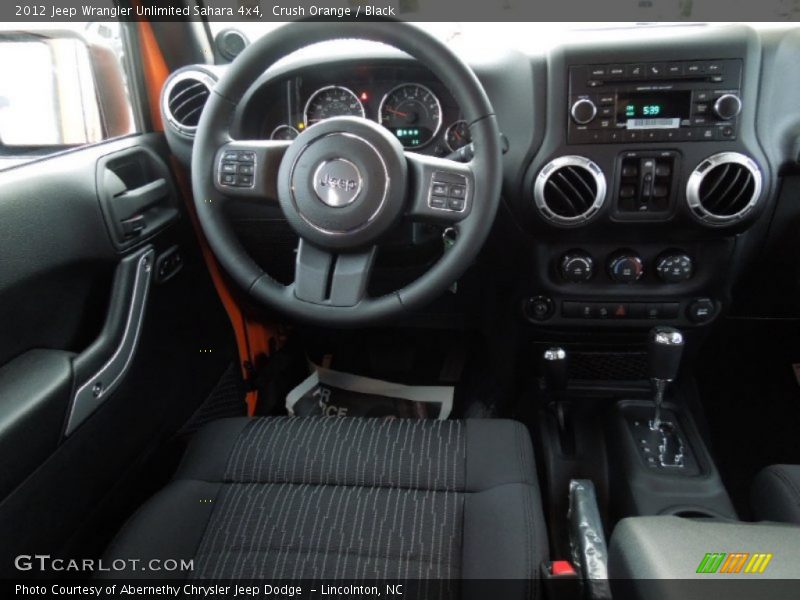 Crush Orange / Black 2012 Jeep Wrangler Unlimited Sahara 4x4