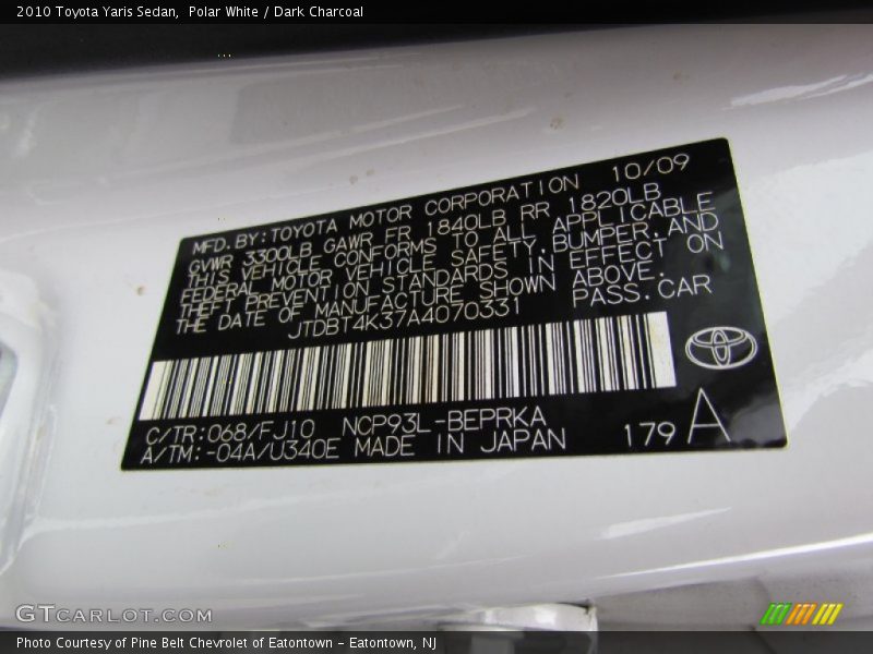 Polar White / Dark Charcoal 2010 Toyota Yaris Sedan