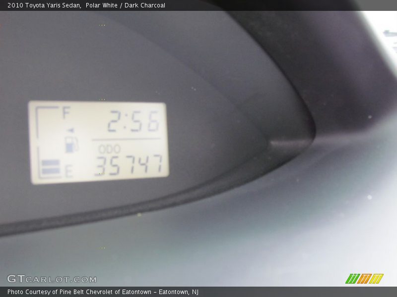 Polar White / Dark Charcoal 2010 Toyota Yaris Sedan