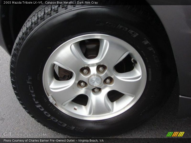  2003 Tribute LX-V6 Wheel