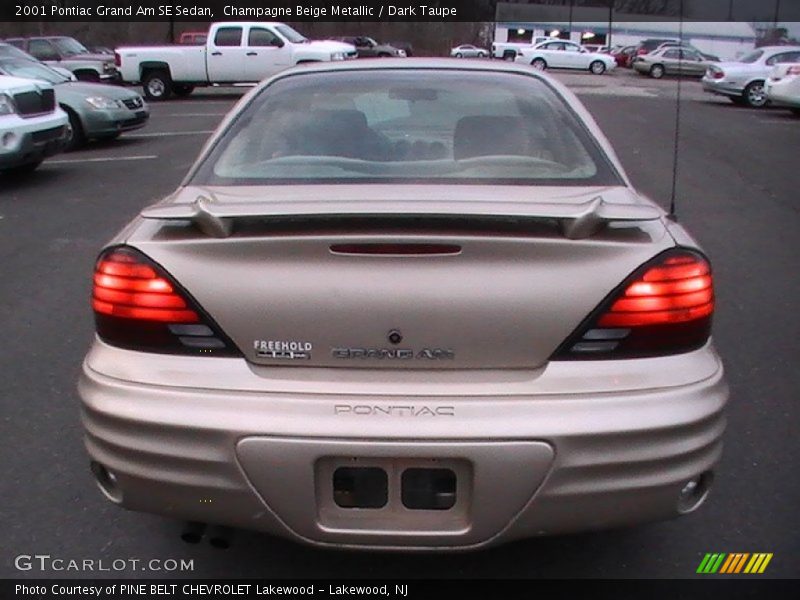 Champagne Beige Metallic / Dark Taupe 2001 Pontiac Grand Am SE Sedan