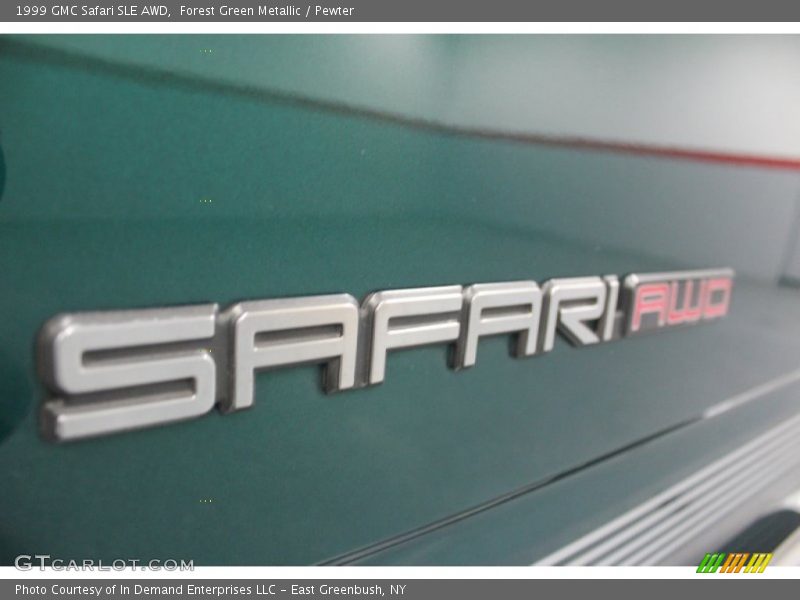 1999 Safari SLE AWD Logo