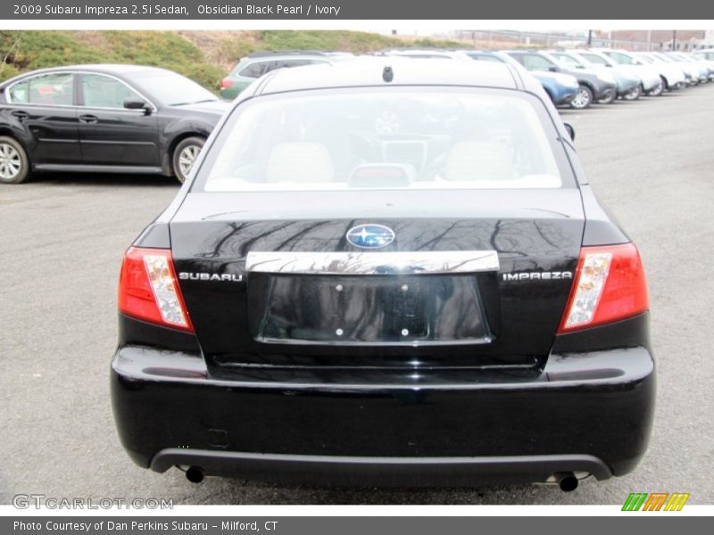 Obsidian Black Pearl / Ivory 2009 Subaru Impreza 2.5i Sedan